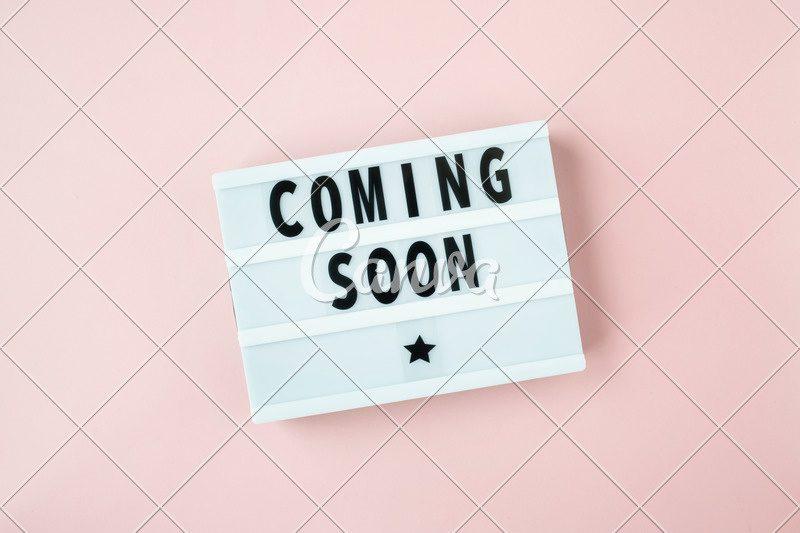A letterboard reading Coming Soon, standing in until Julia’s photograph arrives